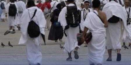 السعودية تدعو قاصدي المسجد الحرام إلي ارتداء الكمامات - هرم مصر